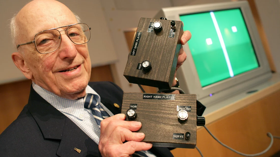 German-American game developer Ralph Baer shows the prototype of the first games console which was invented by him during a press conference on the Games Convention Online in Leipzig, Germany in 2009. Baer died on Saturday. He was 92. Jens Wolf/DPA /Landov
