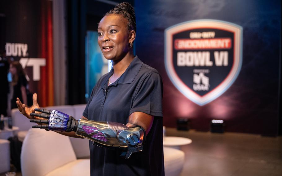 Army veteran and Purple Heart recipient Danielle Green speaks during C.O.D.E. Bowl VI, the sixth iteration of the Call of Duty Endowment’s annual military gaming tournament, in late September 2025. (Call of Duty Endowment) Read more at: https://www.stripes.com/living/entertainment/2025-10-22/danielle-greene-call-of-duty-pack-open-bionics-19507671.html Source - Stars and Stripes