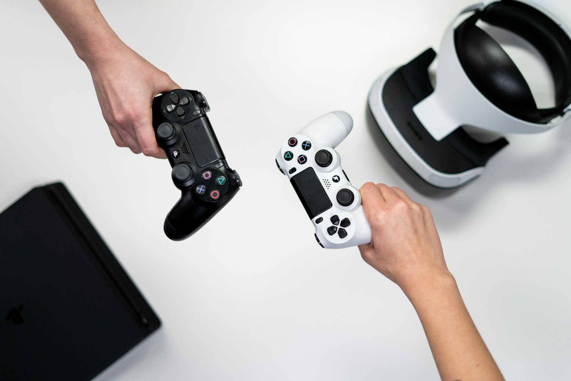 Players holding controllers (Photo: cottonbro studio) Players holding controllers